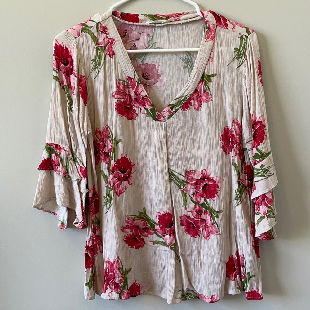 light pink floral blouse
